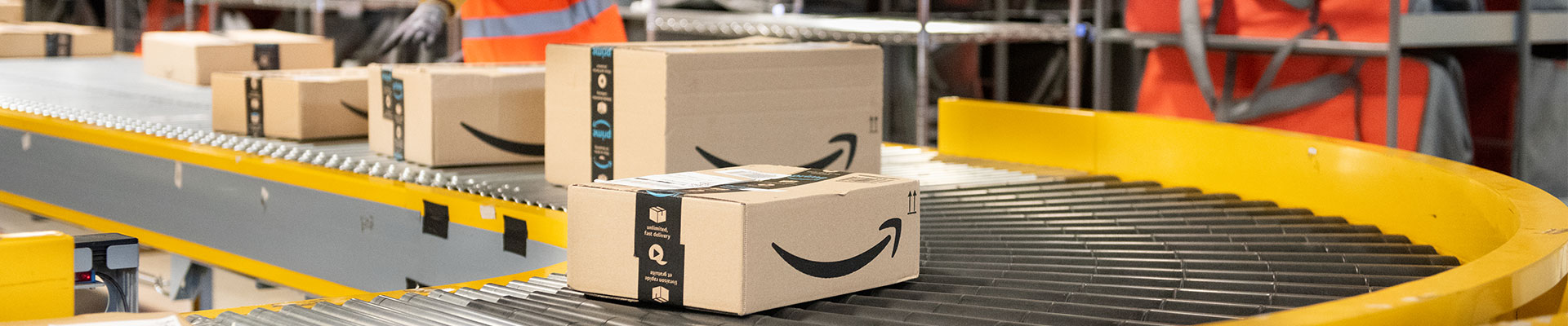 Amazon worker successfully fulfills an order of in-stock items, which is one of the many Amazon Vendor Central obstacles a brand must consider.